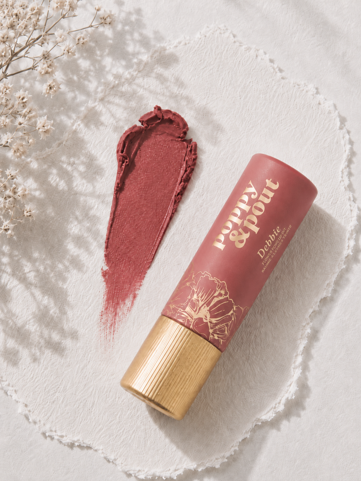 Poppy &amp; Pout Debbie lip tint, dark peach tinted lip balm in a cardboard tube