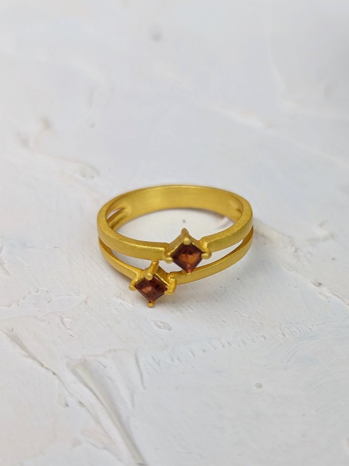Garnet and Gold Split Shank Ring