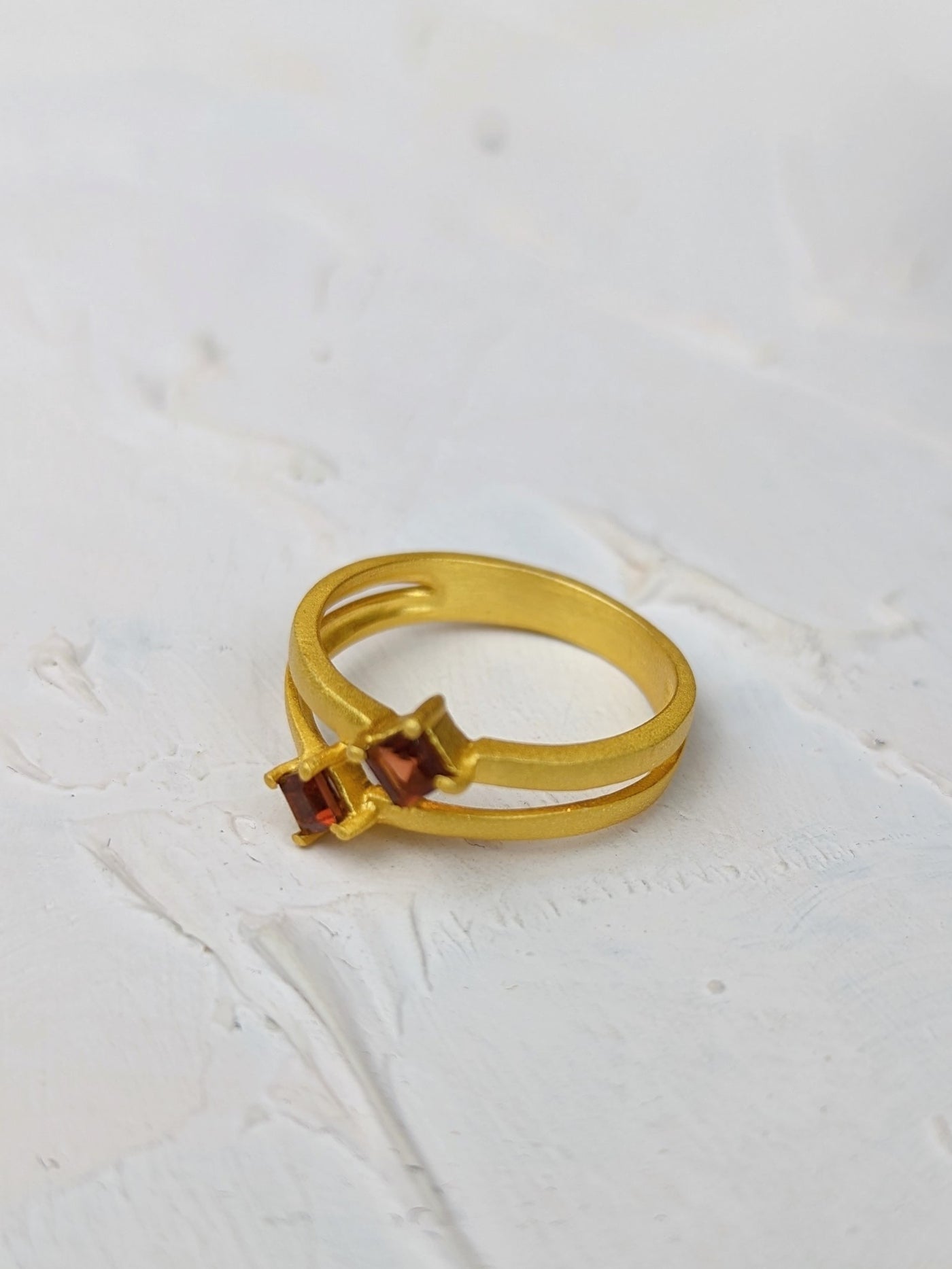 Garnet and Gold Split Shank Ring